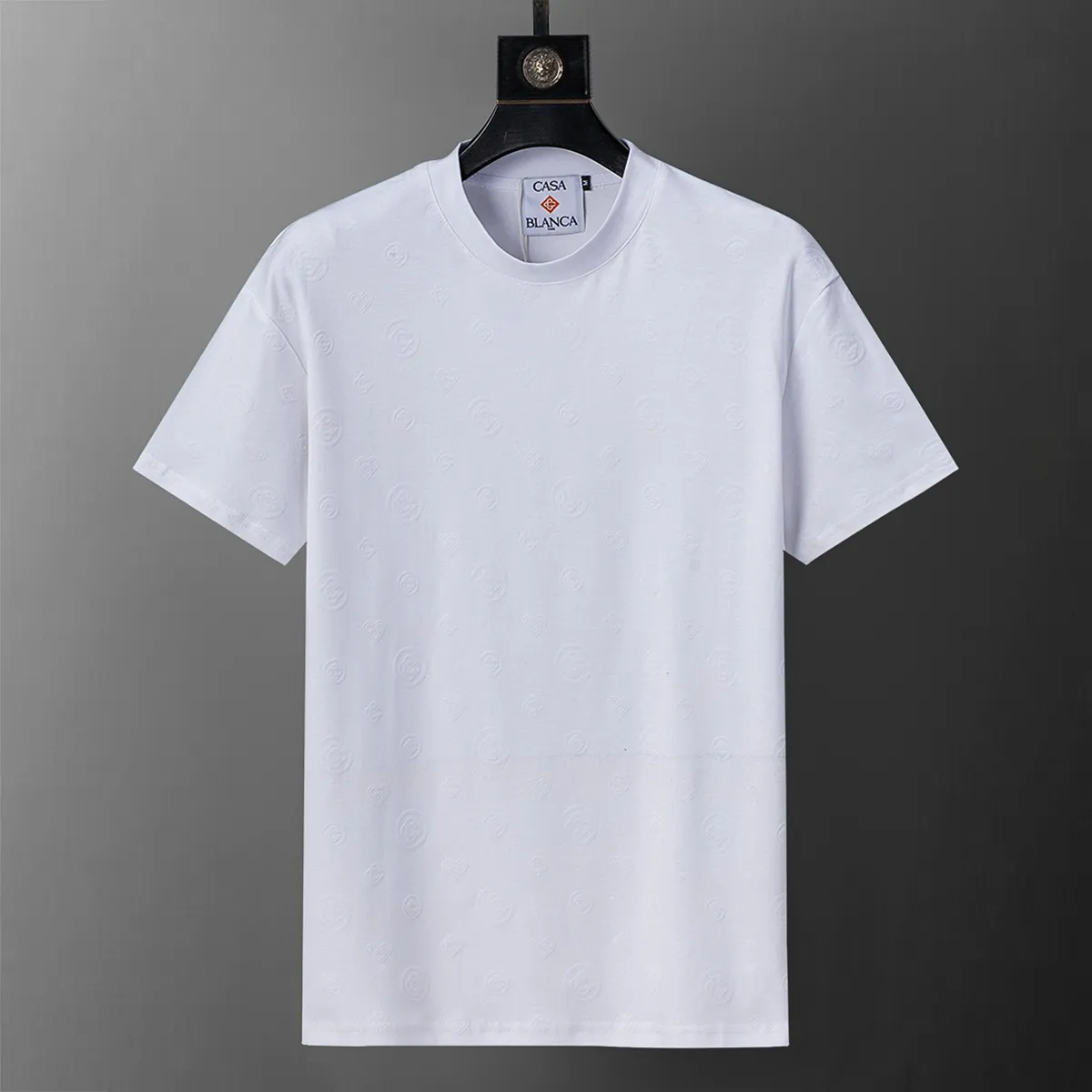 25109# New Arrival round neck T-shirt synchronized with the official website for spring and summer 2026. It is handsome with flocking printing all over. The fabric is comfortable, the workmanship is rigorous, and the wiring is neat. Good upper body effect·Sizes M-3XL White